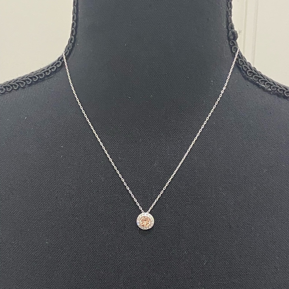 Angelic pendant Swarovski crystal necklace with round pink stone